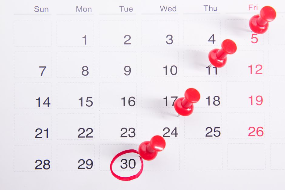 Calendar with pins marking dates, representing the rent grace period
